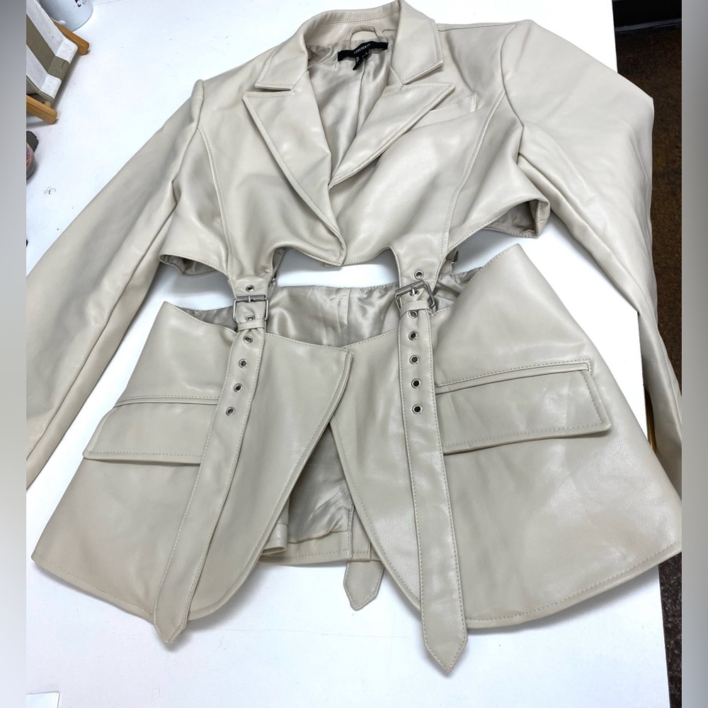 Ladies Cream super cute Cutout jacket, worn once.